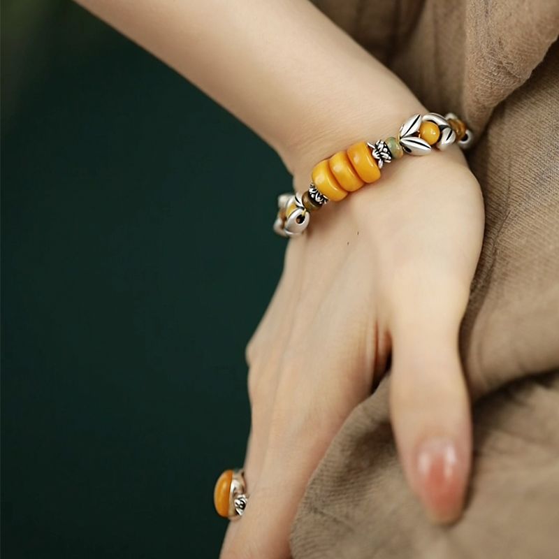 Ethnic Wear Fashion Designer - Gelang manik bulat kuning motif daun